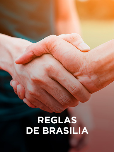 Dos manos estrechándose. Reglas de brasilia